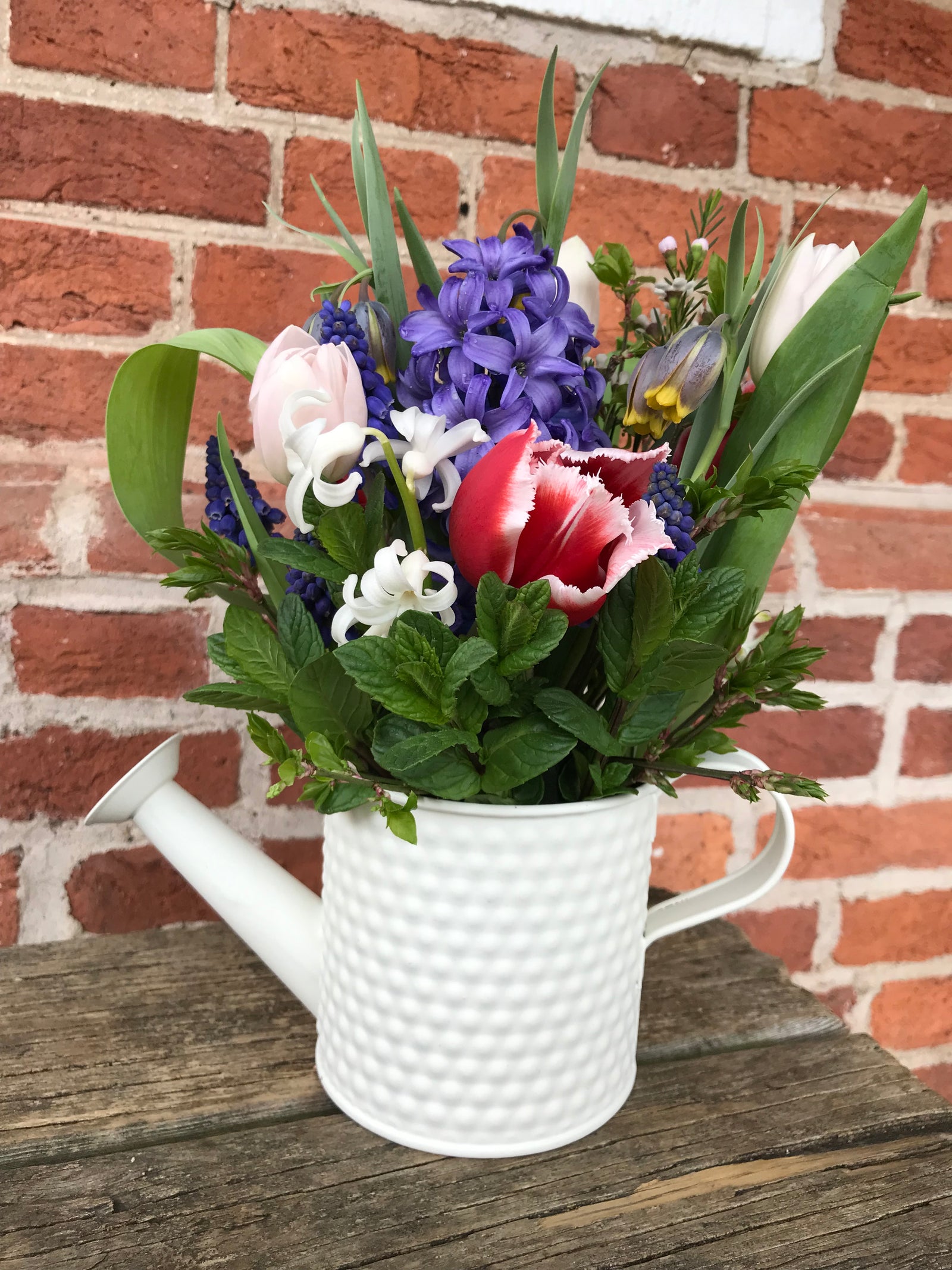 Watering can arrangement